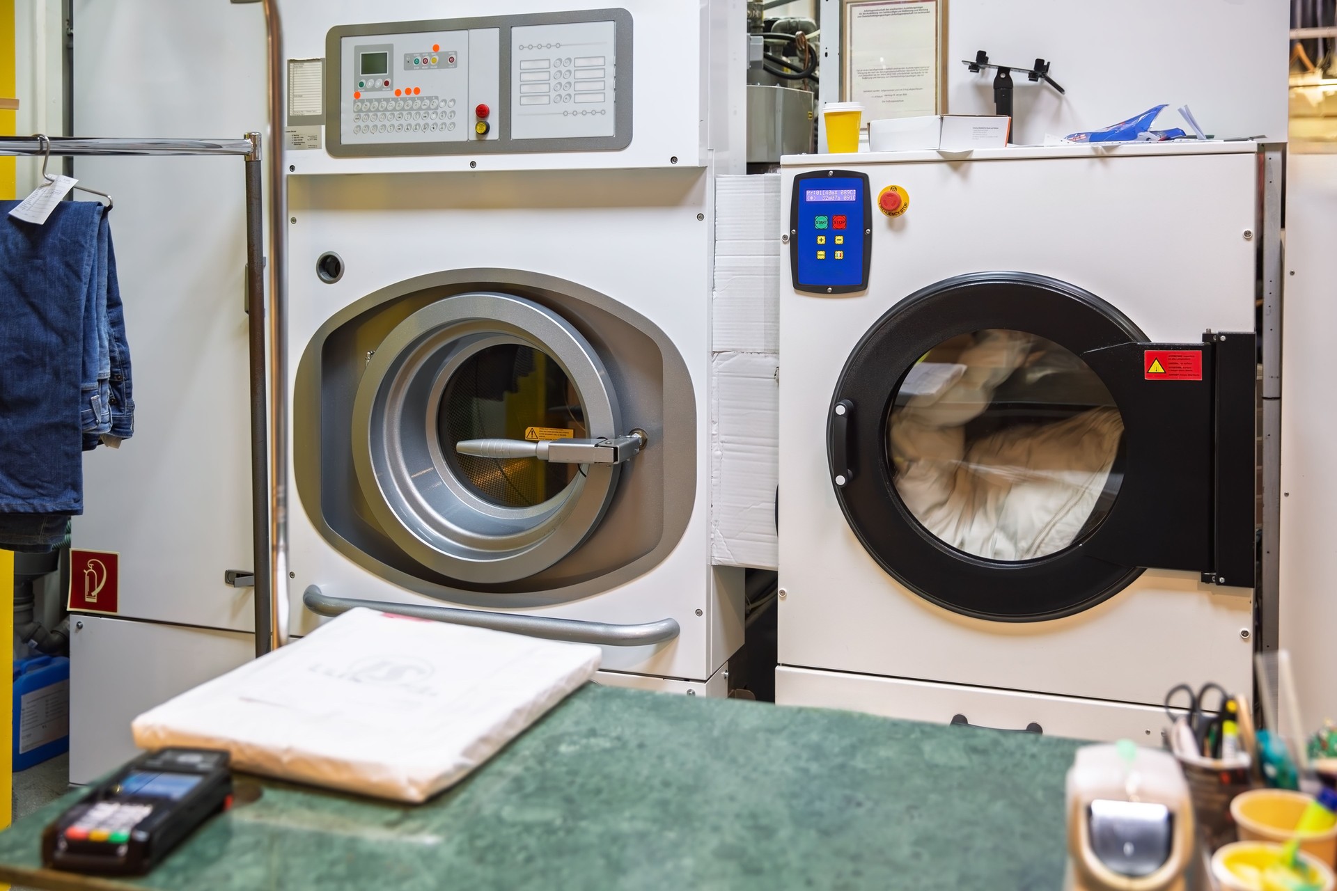 Washing machines drying clothes in a dry cleaning shop since 1990